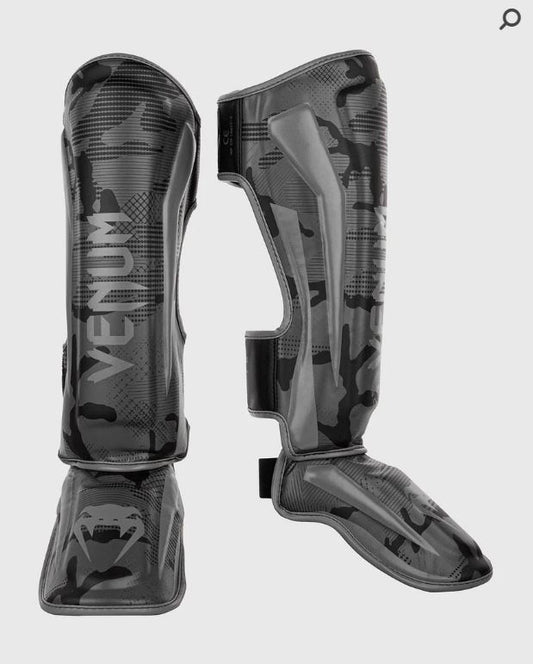 Espinilleras Venum Elite (Negro / Dark Camo) (Disponible por Encargo)